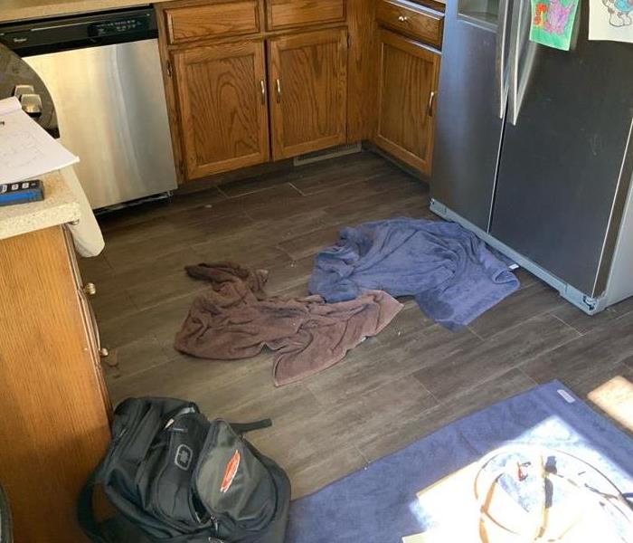 A water damaged kitchen floor