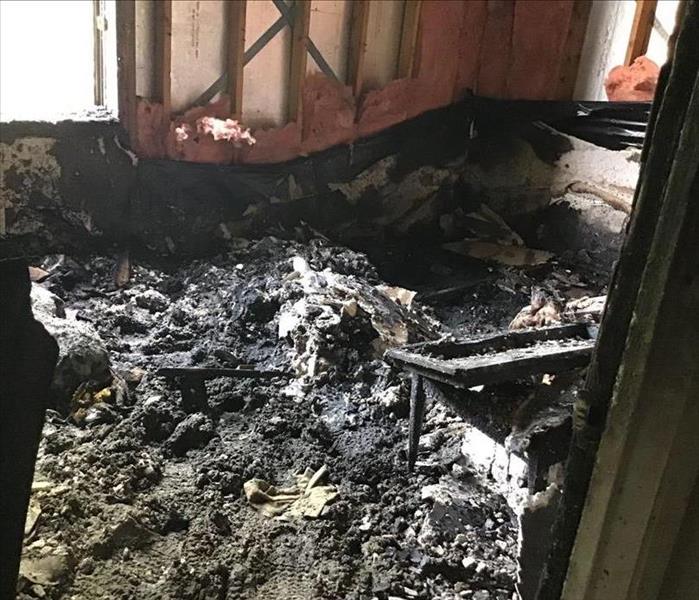 A room filled with burnt insulation 