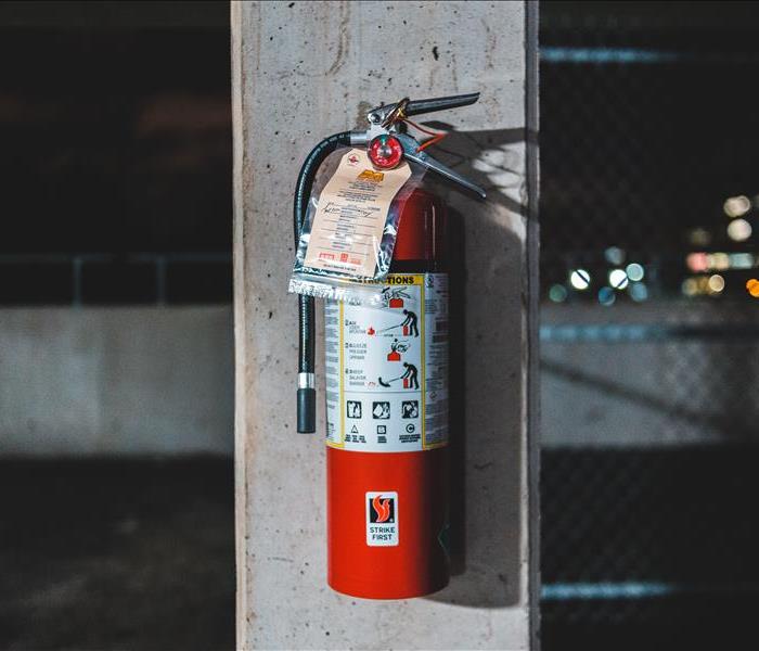 Fire extinguisher hanging on the wall 